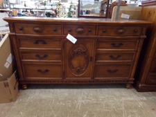 Very nice dresser.  Just when you enter the store to your right.  
$225.00