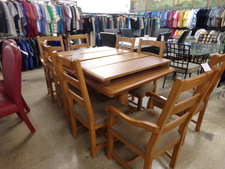 Dining table with 4 extra leaves - great for a large family or entertaining.
Comes with 8 chairs with brown upholstry.
$667.50
