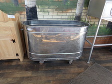 STainless Steel tank.  Guessing about 100 gallons.  Clean and nice.  In our entryway foyer.
$250.00