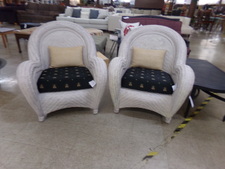 FLAT WEAVE WICKER CHAIRS.  Large and attractive.  Cushions are black with bees on them.  This is Not outdoor furniture - but lakeside interior design for sure!
$150.00