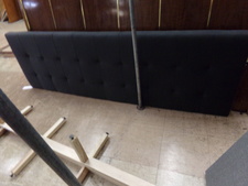 LONG NAVy HEADBOARD.  This kingsize can be a wall mount, or comes with more attachments.  
$135.00