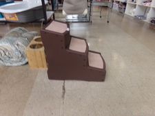 Really nice doggy steps.  Hard plastic construction with carpet on steps.  
$56.30