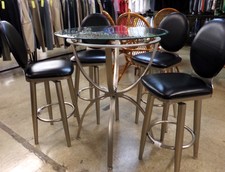 Black and silver hi-top table with 4 stools
$177.30
