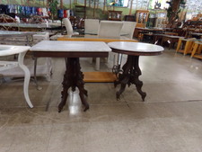 ANTIQUE PARLOR TABLES.  Solid walnut carved - probably from the 30's.  Featured here is the rectangle one.
$105.60
