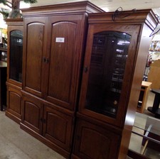 Dark wood entertainment center - lighted curio cabinets - about 7.5ft long 
$500.00