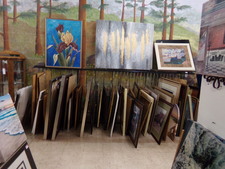PICTURES.  Large canvas size are in rack along wall, medium size in 2 standing racks.  Small picture frames in end caps.  All sizes and all types of decor.
$12.50
