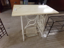 WHITE MARBLE ON VINTAGE TREADLE BASE.  
$125.00