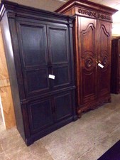 Front cabinet is an Armoir.  Traditional style.  Wood is a dark grey distressed with orange/natural wood streaks.  Very heavy, bring help.  
$408.80