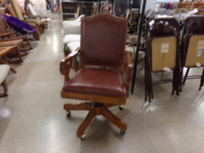 OAK AND LEATHER.  desk chair
$85.00