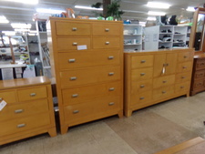 BEACH WOOD BEDROOM.  This set is a side table, a tall dresser with 8 drawers, and a hi-top long dresser with center cabinet & 10 drawers.  Sold as set
$700.00