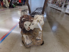 Lion and lioness .  Large figure is very appealing.  Could be inside or outside decor.  26