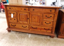 KNOTTY PINE DRESSER.  Has 8 drawers and center cabinet.  Very nice condition.
$120.00