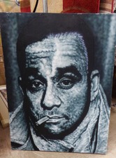 Man on canvas.  Just one of the pictures available in our department.  
$25.40