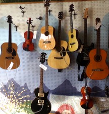 Musical instruments in store - guitars, violins, keyboards and more
*Featured is guitar to far left
$75.00