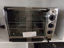 TOASTER OVEN - HAS 2 TIERS.  This Hamilton Beach oven has easy set knobs - not digital.  Set temperature knob, choose Rotisserie, Bake, Convection or Broil, then set the timer.  That's it!find this with microwaves back of store
$27.50