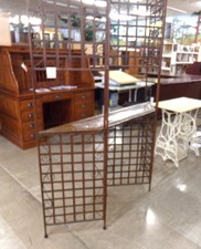 GRID PANELS HOLD A 4 1/2 feet shelf.  Copper with hammered copper shelf.  Take shelf out and the grid will fold up and store away
  
$135.00