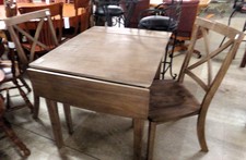 Medium-wood-tone small drop-leaf table with 2 chairs
$112.50