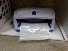 OxlRon Label printer.  Comes with extra ink.
Find in craft department
$19.50