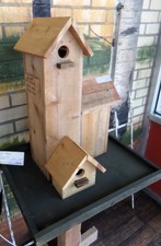 Hand-crafted wooden bird house
$50.00