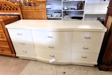 White 9 drawer dresser.  6 ft wide.  Probably from 60's and is solid wood.  
$202.50