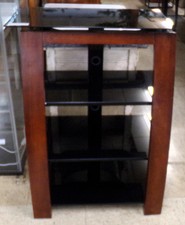 Dark wood and black glass TV shelf
$63.30