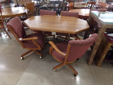 Octagon shape table.  Has a leaf in it in the photo.  Comes with 4 coaster chairs.  Table has the formica hard top great for families.
$495.00