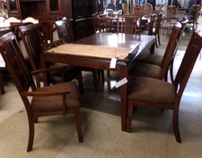 Dark wood table with 8 matching brown chairs
$895.00