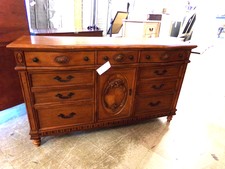 SOLID OAK.  Beautiful dresser with center cabinet.  7 drawers - 2 are deep.
$895.00