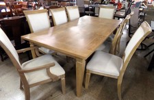 Light wood table and chairs
8 Chairs with creamy-white upholstry
$1295.00