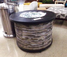 FIRE PIT  for your patio.  Slate rock exterior.  Gem rocks in center for fire distribution.  About 40