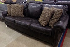 Dark brown leather studded sleeper sofa
$746.30