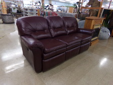 DOUBLE RECLINER.  Dark brown leather.  Not electric.
$895.00