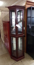 Corner curio cabinet .  Glass and mirror accents
$375.00