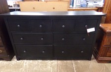 This black dresser has easy glide drawers.  
$295.00