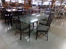 Dark brown metal framed table and chair set
Glass top
6 chairs included
$371.30