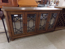 Wooden multi-use cabinet with tarnished mirror doors.  Has electrical outlets inside right.  5 ft long
*Walter of Wabash brand
$495.00
