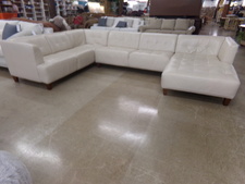SECTIONAL.  Creamy white leather set.  Can be re-arranged.  This arrangement uses 12' width has chaise at one end.
$1495.00