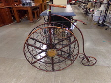 Brown and gold bike-shaped wine rack
$225.00