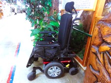 MOTORIZED WHEEL CHAIR/SCOOTER.  This unit has 6 wheels and is a heavy steel foundation.  Foot rests are folded up in photo.  Find at front of store by KoCaMo.
$800.00