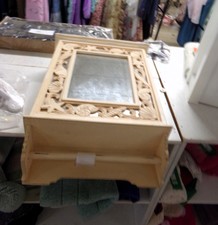 MEDICINE CABINET...  
Has starfish and shells.  Wood design frame
$19.50